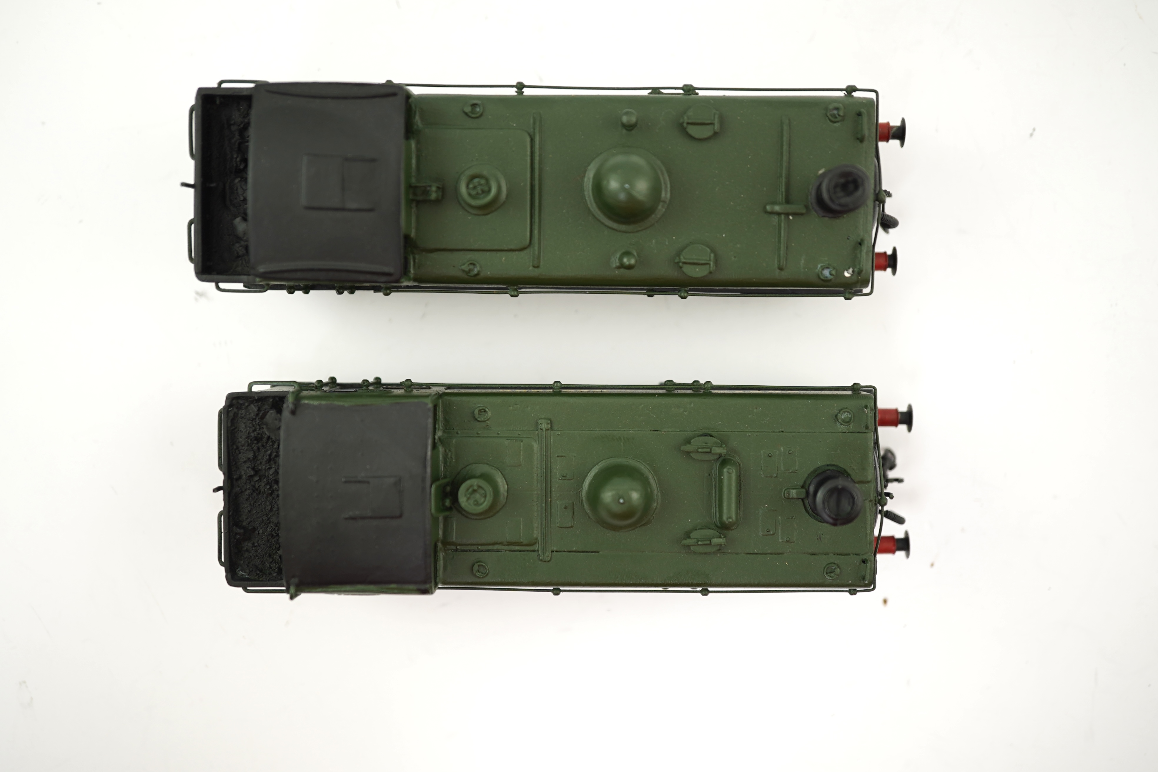 Two 00 gauge brass and white metal kit built GWR Pannier Tank locomotives; a 1600 class 0-6-0PT, 1600, together with an 7400 class 0-6-0PT, 7404, constructed, painted and lined to a high standard, both motored for two ra